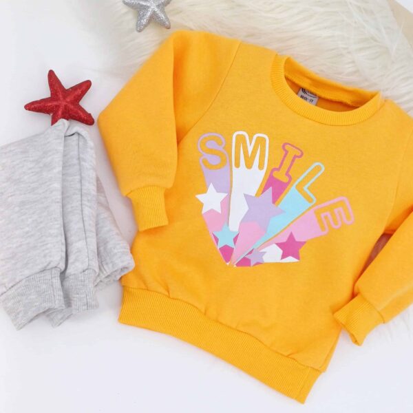 Ensemble hiver "Smile" pour enfants de 1 à 4 ans. Un look coloré et chaleureux pour égayer l'hiver ! Commandez maintenant.
