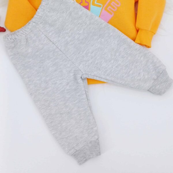 Ensemble hiver "Smile" pour enfants de 1 à 4 ans. Un look coloré et chaleureux pour égayer l'hiver ! Commandez maintenant.